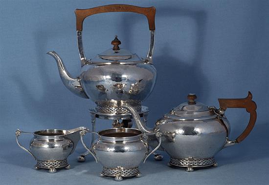 A Georged V silver Arts & Crafts three piece tea set,